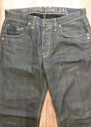 Классные мужские джинсы с кожаными вставками3 фото