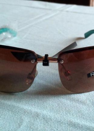 Модні окуляри прямокутної форми в металичесской антиоправе, сонцезахисні окуляри revlon2 фото