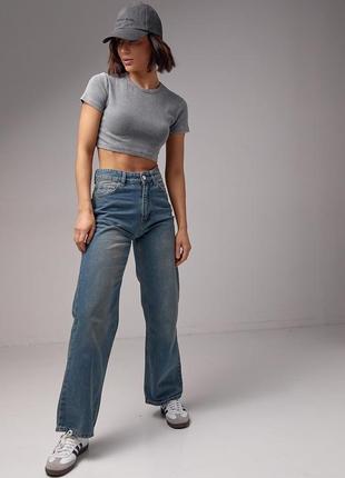 Женские джинсы с эффектом потертости2 фото