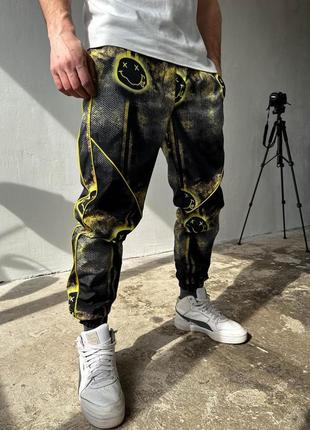 Спортивные штаны с принтами2 фото