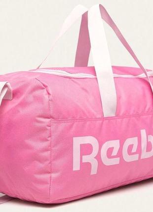 Спортивная сумка reebok sport act core m grip розовая на 35л