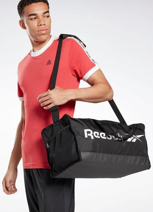 Спортивная сумка 35l reebok training essentials medium черная3 фото