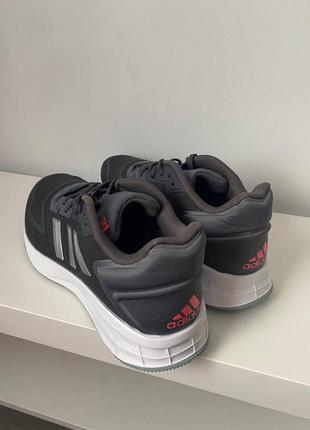 Беговая обувь adidas duramo 10 gw8346 grey six/silver metallic/turbo2 фото