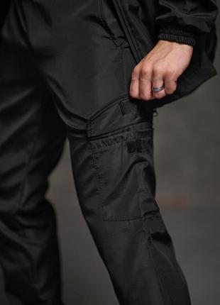 Мужские спортивные повседневные брюки софтшел черные, высокая какие-то2 фото