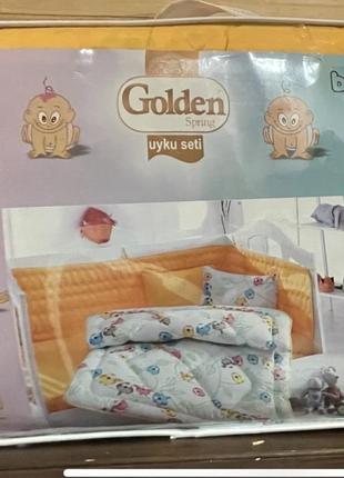 Набір білизни в дитяче ліжечко1 фото