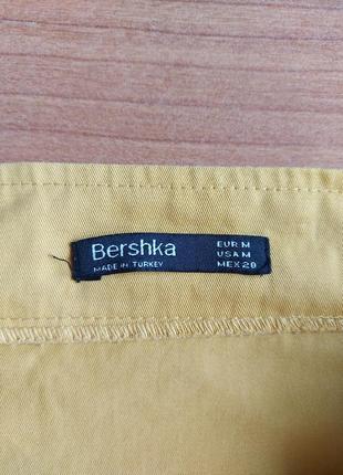 Желтая коттоновая юбка юбка bershka с пуговицами, р. м5 фото