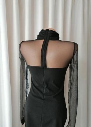 Стильна сукня по фігурі з прозорим рукавом4 фото