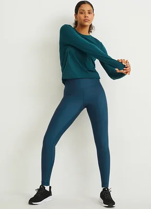 Технічні легінси з гладкого еластичного трикотажу з технологією швидкого висихання