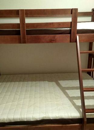 Тримісна ліжко з ящиками.