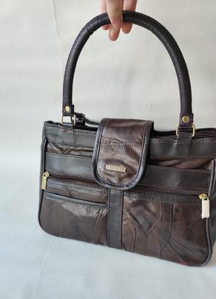 Клатч-багет з асиметрією шоколадний .