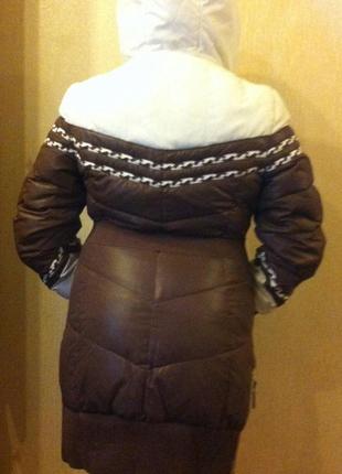 Пуховик зимовий жіночий.3 фото