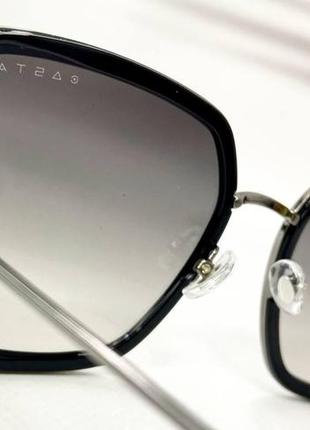 Сонцезахисні окуляри жіночі геометричні обзорні в комбінованій оправі з градієнтним тонуванням лінз3 фото