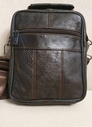 Чоловіча сумка fuzhiniao 66032-3
із натуральної шкіри.6 фото