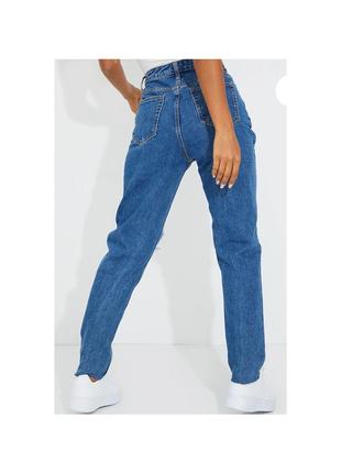 Актуальные рваные джинсы мом, стильные, базовые, модные, трендовые2 фото