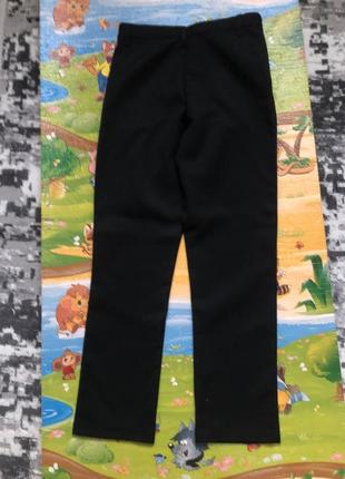 Штаны классические для мальчика 10 -11 лет в, в черном цвете.