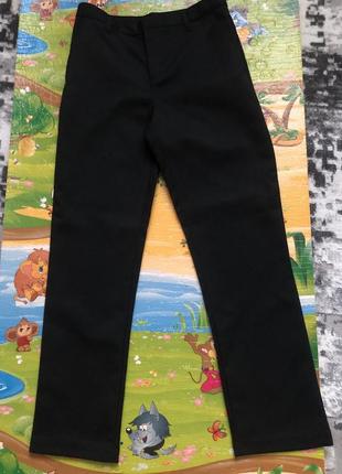 Штаны классические для мальчика 10 -11 лет в, в черном цвете.2 фото