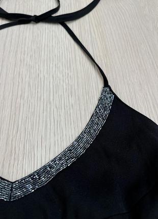 Чорна міні сукня з розрізами по боках на брительках у розмірі s від бренду3 фото