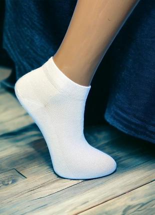 Жіночі шкарпетки в сіточку3 фото