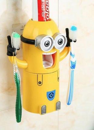 Дозатор зубной пасты детский миньон2 фото