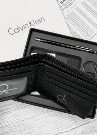 Набор calvin klein кошелек + ручка + брелок2 фото