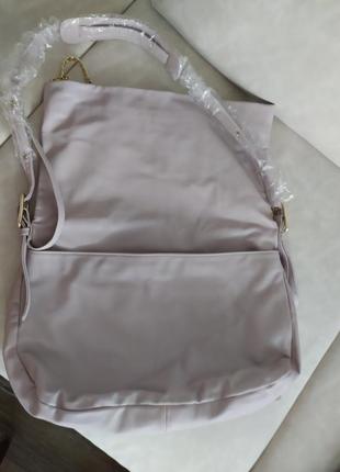 Фірмова об'ємна сумка valencia пудровий колір6 фото