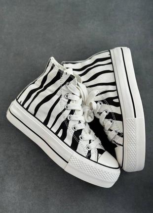 Converse chuck taylor all star high zebra
масивні кеди анімалістичні чорно білі конверс на високій платформі черно белые кеды на высокой подошве6 фото