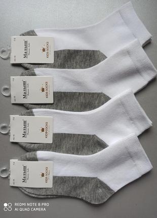 22-26/27-30/31-34 демисезоні білі шкарпетки із сірою стопою1 фото