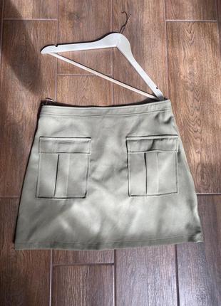 Тонкая шифоновая юбочка с накладными карманами1 фото
