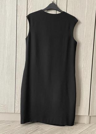 Изысканное коктейльное платье в черном цвете3 фото
