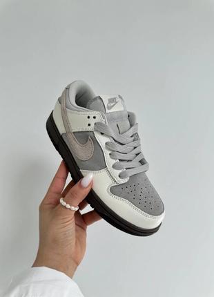 Класні жіночі кросівки nike sb dunk low grey white gum білі з сірим2 фото