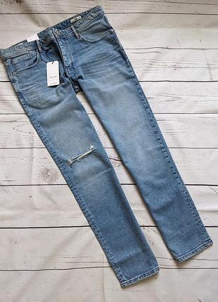 Джинси з прорізом на коліні від jack& jones