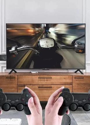 Ігрова консоль приставка для телевізора 4k система android tv 106 фото