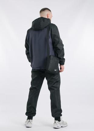 Комплект весняний чоловічий в стилі nike: анорак чорно-сірий + штани  + барсетка у подарунок4 фото