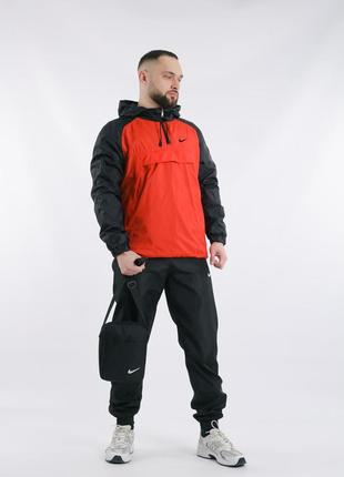 Комплект весенний мужской в стиле nike: анорак черно-красный + брюки черные + борсетка в подарок5 фото