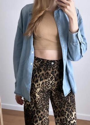Самі трендові джинси штани в леопардовий принт10 фото
