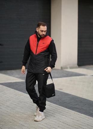 Комплект весняний чоловічий в стилі nike: жилетка помаранчево-чорна+штани чорні+барсетка у подарунок8 фото