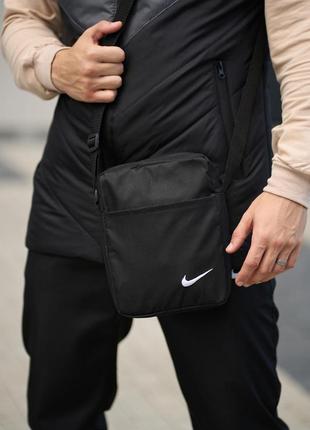Комплект весняний чоловічий в стилі nike: жилетка сіро-чорна+ штани чорні + барсетка у подарунок9 фото