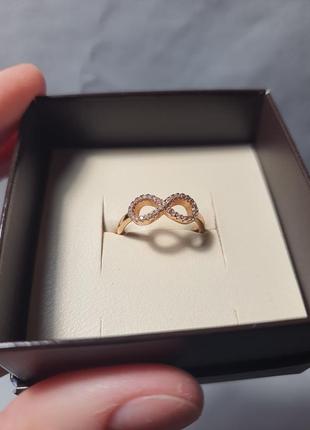 Кольцо кольца кольццо золотое с камнями