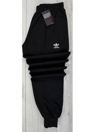 Штани спортивні adidas чорні штани спортивні адідас чорного кольору штани для спорту чорні з манжетами адідас