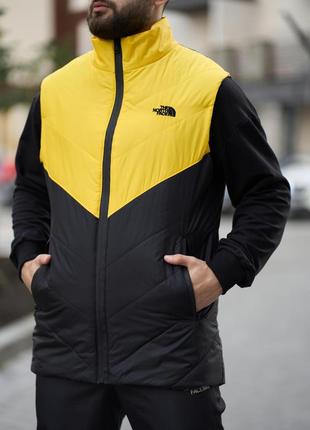 Комплект весенний мужской в стиле tnf: жилетка желто-черная+ брюки черные + борсетка в подарок4 фото