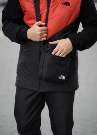 Комплект весняний чоловічий в стилі tnf: жилетка помаранчево-чор+ штани чорні + барсетка у подарунок4 фото
