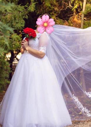 Продам весільну сукню4 фото