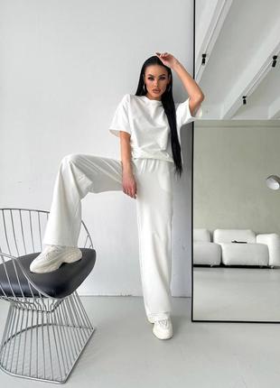 Жіноча якісна чорна біла бавовняна футболка з камінчиками, зі стразами5 фото