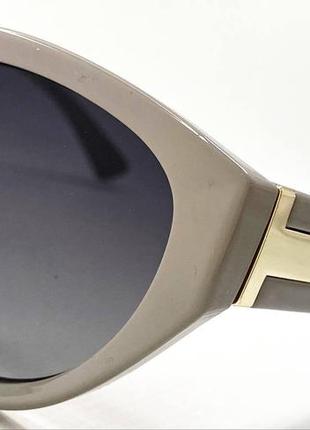 Поляризуючі сонцезахисні жіночі окуляри пудрово-сірий3 фото