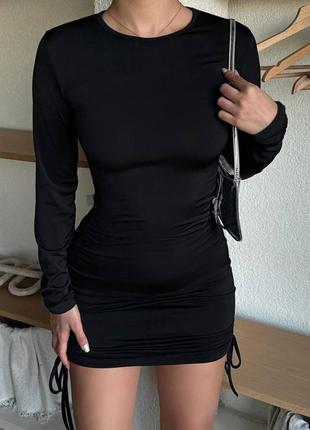 Жіноче стильне коротке плаття на фігурі з затяжками розміри 42-463 фото