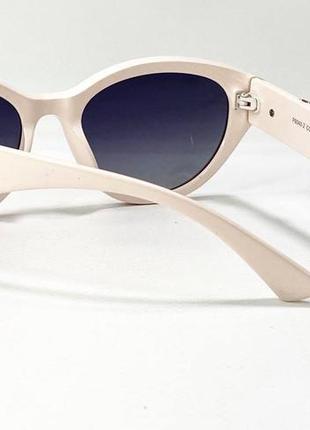 Поляризуючі сонцезахисні жіночі окуляри молочно-рожеві4 фото