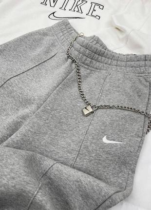 Женские весенние штаны nike джоггеры оверсайз с лого на манжете размеры 42-503 фото