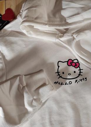 Укорочене худі (кроп-топ) з капішоном та принтом hello kitty білого кольору, розміру м6 фото