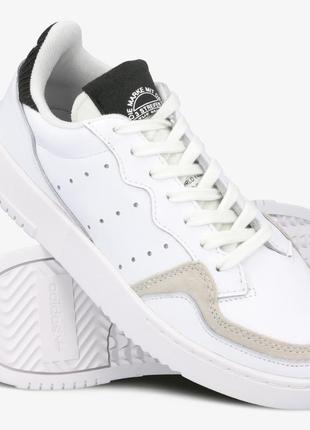 Шкіряні білі кросівки adidas supercourt fu9501