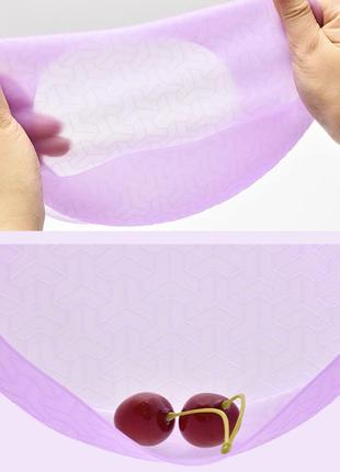 Слюнявчик силіконовий дитячий з кишенькою напівпрозорий 29,5х20,5 см фіолетовий3 фото